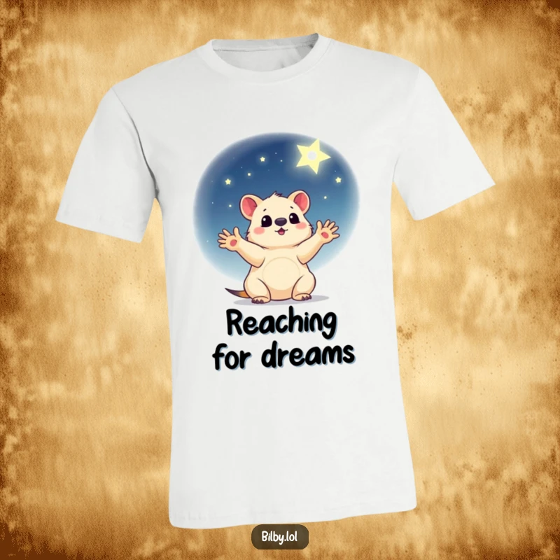 Funny t-shirt with a little marsupial, paws outstretched, reaching for a shining star in a gentle night sky.