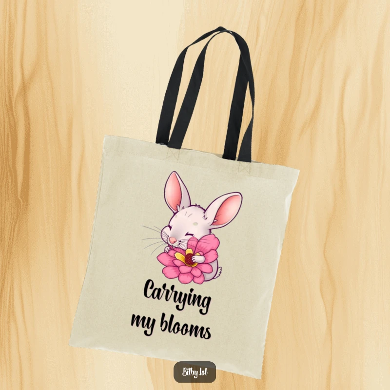 Funny bilby with long ears twitching, excitedly sniffing a large, colorful flower on a durable tote bag, making a humorous and practical gift.